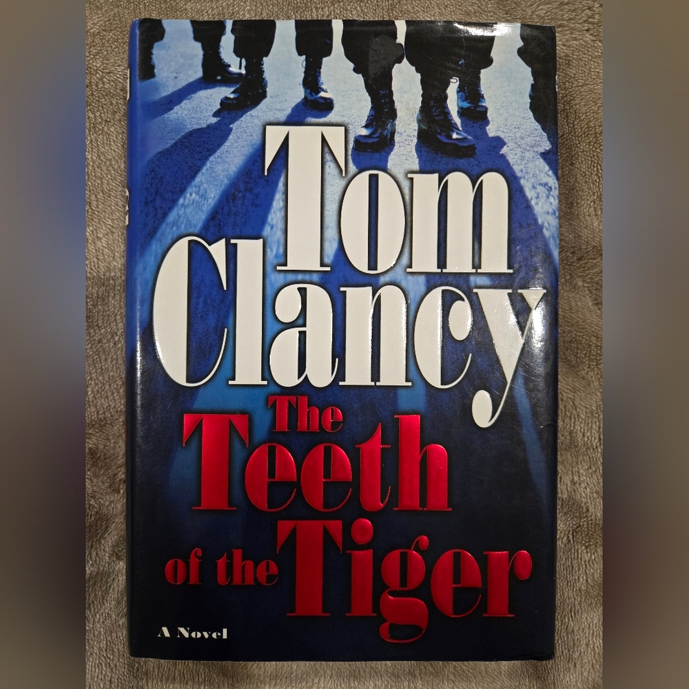 'The Teeth of the Tiger' Hardcover Book